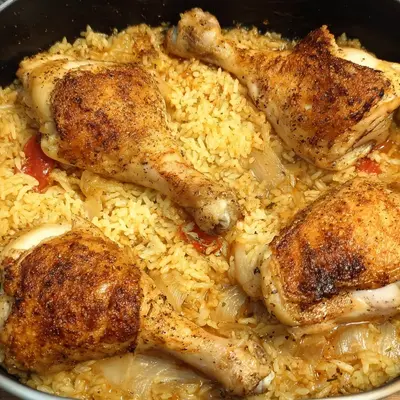 Zarte Hähnchenkeulen Reis One Pot Dampfofen